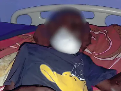 Le miraculé Trésor sur son lit d’hôpital