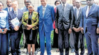 Le ministre de la Justice par intérim et les participants après l’ouverture de l’atelier.